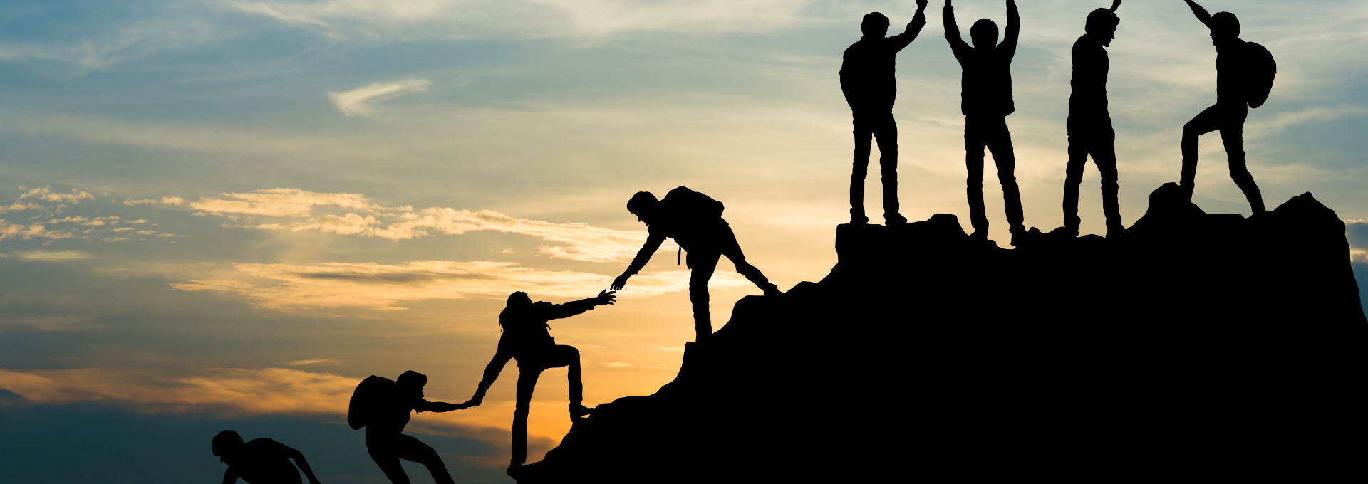 Helping each other up mountain banner