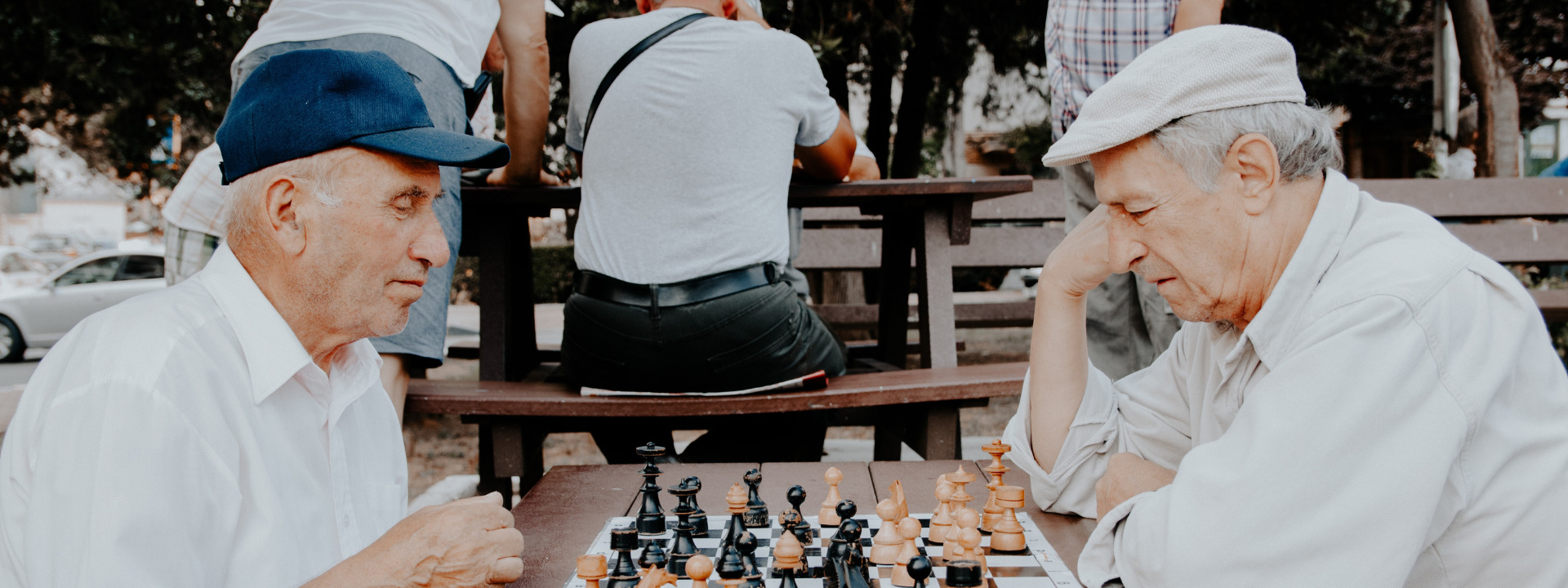 Old men playing chess banner
