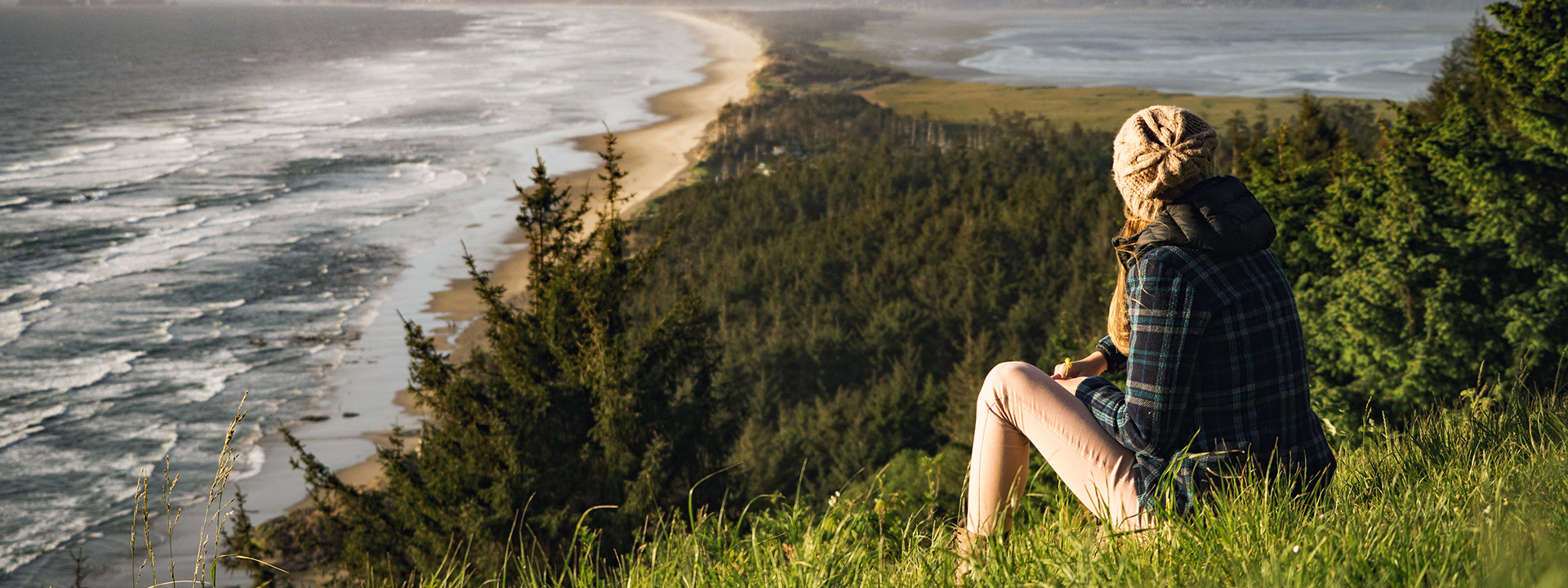 Woman overlooking sea banner